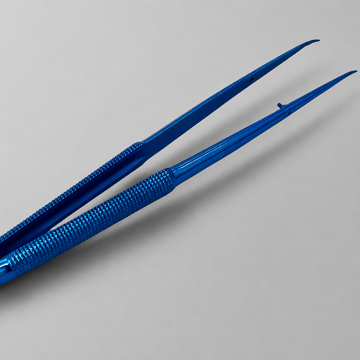 PINZA GERALD CURVA 18 CM TITANIO